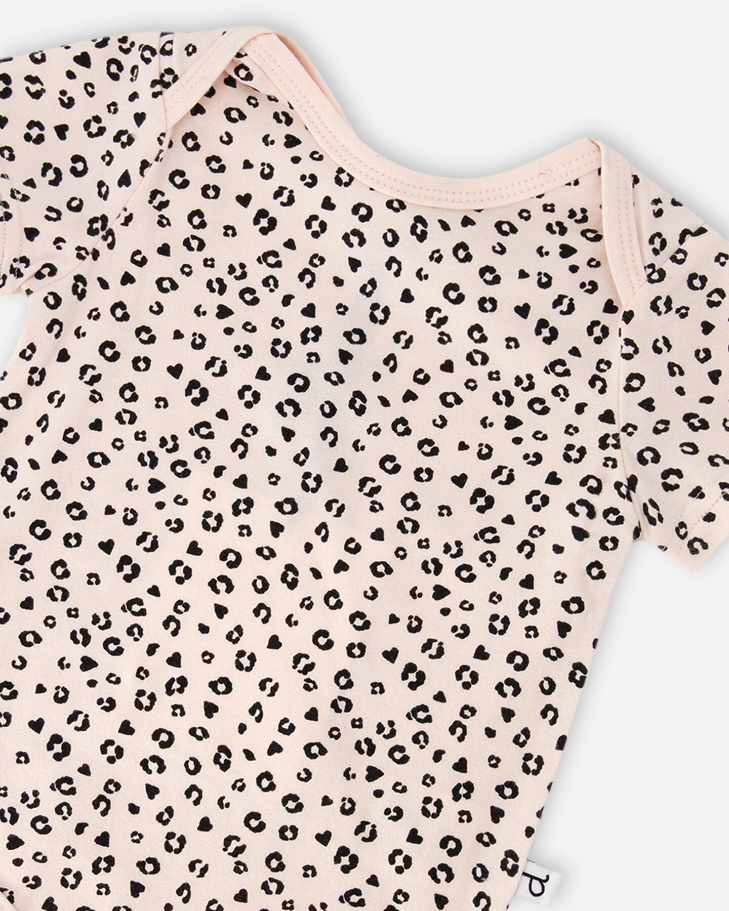 Evolutive Organic Cotton Jersey Onesie Peach Animal Print : Grenouillère en jersey de coton biologique Evolutive, imprimé animal pêche